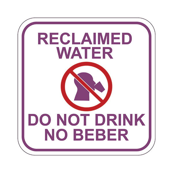 Image of Reclaimed Water Sign in white with purple border and text